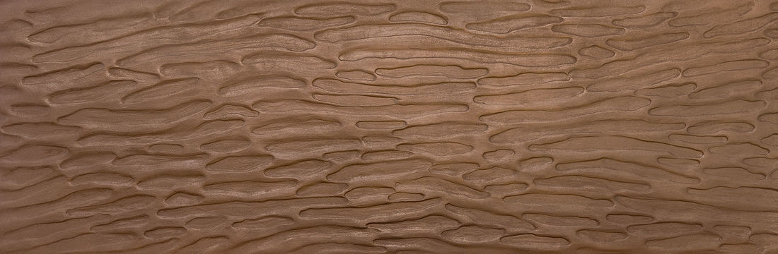 Bronze finish on Erosion Panel